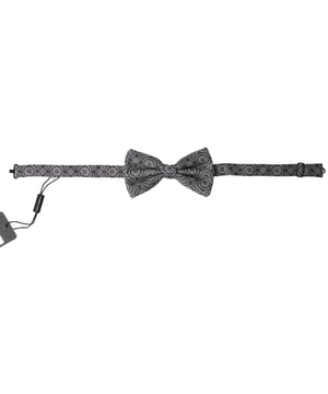 <ul>
  <li>100% autentico Dolce & Gabbana</li>
  <li>Patron de fantasia en blanco y negro</li>
  <li>100% seda</li>
  <li>Correa ajustable para el cuello talla unica</li>
  <li>Ancho: 125 cm Longitud: 7 cm</li>
  <li>Fabricado en Italia</li>
</ul>