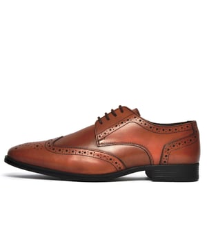 The Catesby England Bolsover is a high-end brogue that boasts outstanding style and design. With a light burnished effect, the Bolsover delivers vintage styling every time and provides the perfect mix between smart and casual and is sure to add a touch of the debonaire style to any mans outfit.
 Crafted in premium leather with intricate stitch and punch-hole detailing, these brogues boast a timeless style. A classic lace up system, durable outsole with a slight raised heel, and subtly cushioned insole complete this must-have shoes.
 - Premium leather upper
 - 4-hole lace closure
 - Intricate stitch and punch-hole detailing
 - Durable outsole  - Authentic vintage styling