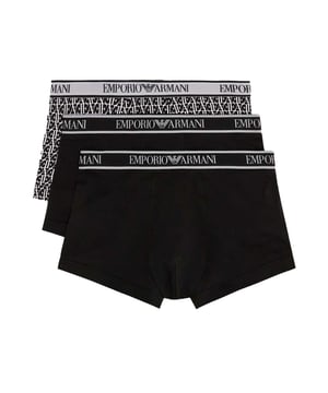 Mens Emporio Armani 3 Pack of Trunks in black.- Branded elasticated waistband.- Stretch fabric.- 95% Cotton  5% Elastane.XS = 27-29inS = 30-32inM = 32-34inL = 34-36inXL = 37-39inXXL = 39-41in- Ref: 11213041735421We regret that underwear is non-returnable due to hygiene reasons.