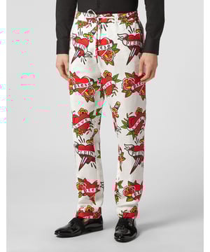 Añada una pizca de exclusividad Plein a su look. Eche un vistazo a estos pantalones de corte holgado y combínalos como quieras.   Lino puro con estampado Love.   Cintura elástica con cordón de ajuste y botón   Bolsillos con aberturas   Ajuste: Jogging