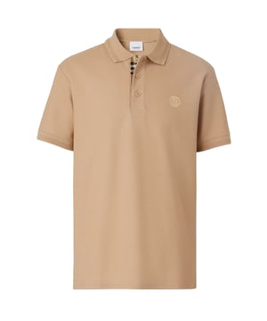 Burberry Branded Circle Logo Camel Beige Polo Shirt. Erhöhen Sie Ihren Stil mit dem Burberry Beige Polo Shirt. Dieses ikonische beigefarbene Poloshirt von Burberry ist nicht nur modisch, sondern bietet auch eine bequeme Passform und hochwertige Qualität. Perfekt für jeden Anlass, dieses Hemd wird Sie auffallen lassen und Sie werden sich sicher fühlen... Burberry Camel Poloshirt, 100% Baumwolle. Knopfverschluss im Nacken, Halsausschnitt mit Kragen. Markenmuster unter der Knopfleiste. Stil: 8057088 Eddie