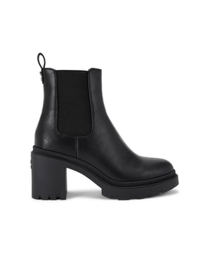 This Carvela Boulder Heeled Ankle Boot features a black upper with elasticated panels on the ankle for slip-on ability. There is a gunmetal Icon C stud at the back of the ankle. Heel height: 7.5cm.