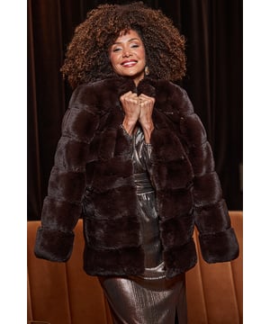 Snug, meet stylish
Crafted from the softest faux fur
On-trend chocolate hue
Flattering hem length
Up the going-out glam factor
Elevate jeans and a jumper