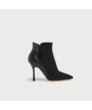 A sexy new style in our autumn/winter shoe collection, our Aliyah ankle boots have incredible shape. Crafted in Spain from a stylish blend of black suede and nappa leather, they have pointed toes, inside zips and 100mm slender heels with flared detail. Sophisticated and stable, wear them with autumn's midi dresses and sleek tailoring alike.