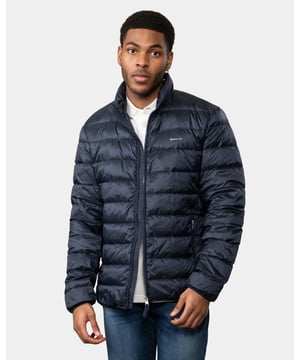 Crafted from a lightweight recycled polyester with a water-repellent finish, Gant Light Down Jacket is the perfect layering piece for sudden drops in temperature. This jacket is fully lined and has one interior patch pocket and one interior zip pocket.
Regular fit  Straight channel quilting  Water-repellent  Locker loop with logo at back
Shell - Recycled Polyester 100%, Lining - Recycled Polyester 100%, Padding - Down 90%, Feathers 10%
7006298
&nbsp;
