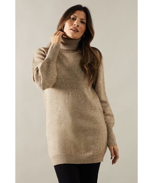 Cosy roll neck design for ultimate comfort
        Striking balloon sleeves add a touch of drama
        Tunic length offers versatile styling options
        Ribbed cuffs and hem for a polished finish
        Relaxed fit allows for easy layering
    
    Embrace sophistication and comfort with this exquisite roll neck balloon sleeve knitted tunic from Wallis. Perfect for the woman who appreciates glamour without compromising on cosiness, this piece is a versatile addition to your wardrobe. The tunic length allows for effortless styling - pair it with sleek leggings and knee-high boots for a chic daytime look, or dress it up with tailored trousers and heels for more formal occasions. The statement balloon sleeves add a contemporary twist to the classic roll neck silhouette, ensuring you stand out at family gatherings or casual events. Layer it over a slim-fit turtleneck for extra warmth during colder months, or wear it on its own as a stylish dress. This Wallis tunic is the epitome of effortless elegance, promising to be a go-to piece for various occasions throughout the season.