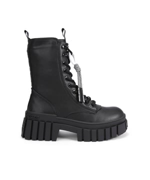 The KG Kurt Geiger Tegan Lace Up Boot features a sleek black upper with statement lace up front. There is a black and white toggle on the front which can be removed. The sole is large with exaggerated tread.