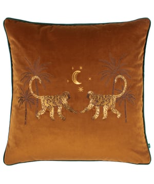Two embroidered, intricately detailed monkeys scamper among the desert foliage under a clear, starlit sky on this beautifully designed cushion. Lovingly embroidered onto opulent velvet and surrounded by a solid contrast piped trim, with a hidden zip and plain reverse; this eye-catching cushion will add character and a touch of the exotic to your home furnishings.