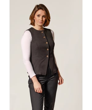 Discover the perfect blend of style and functionality with this tailored waistcoat. Featuring a flattering round neck, button front, and tailored fit, this waistcoat is designed to accentuate your curves and discreet front pockets. 
