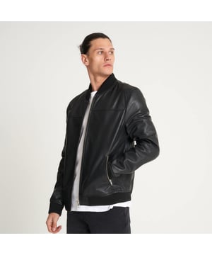 Cover all bases with this classic leather bomber jacket from Barneys Originals. Cool and casual, this jacket can be paired with just about any outfit. Easy to throw on, with timeless style, there are few jackets that compare to this sheep leather essential.