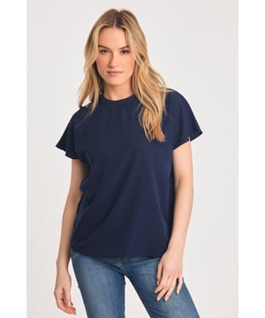 This crepe top from French Connection is a wardrobe essential. Features crew neck and short sleeves.
