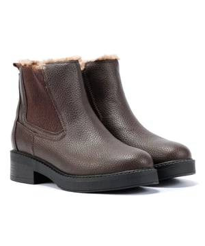 Chelsea style boot with a chic faux-leather upper, convenient zip closure, and a stylish 1.5-inch stacked heel. Perfect blend of fashion and comfort for any occasion.