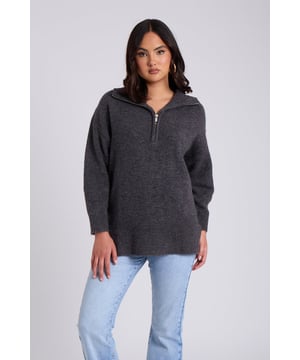 Model is 5'6 and wears a size 8. Introducing our effortlessly chic and comfortable&nbsp;Charcoal Plain Oversized Half Zip a versatile addition to your wardrobe that combines style with ease. This Sweater is designed for those who want a perfect balance between fashion-forward flair and laid-back comfort.  Crafted with utmost attention to detail, the&nbsp;Charcoal Plain Oversized Half Zip boasts a relaxed and flattering oversized fit that drapes elegantly, providing a cosy and stylish look for any occasion. Its soothing creates a sense of sophistication, making it a timeless piece that can effortlessly transition from season to season.