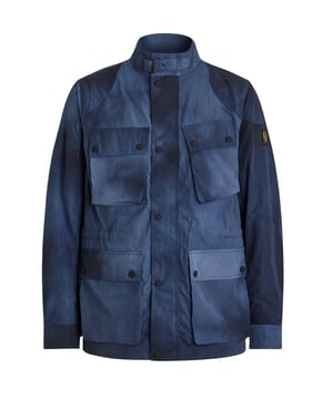 Experience the ultimate in versatility and style with the Belstaff Blue Jacket. This jacket offers both warmth and fashion-forward design, allowing you to effortlessly transition from a casual day look to a chic evening ensemble. Stay cozy and look amazing with this must-have jacket!, Leather Jacket, Material: 100% Polyamide, Lining: 100% Polyamide, Wave dye process so each peice is unique, Water-repellent and wind-resistant, this lightweight iteration of the Icon style is unlined for ease of wear in warmer weather, Embroidered-edge Phoenix patch on sleeve, Zip Closure,Blue Coat, Large Pockets