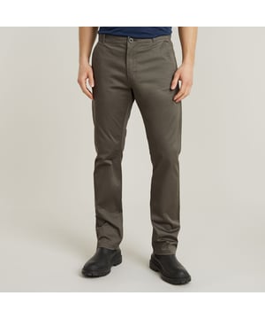 Zip fly. Inset pockets, integrated coin pocket. Welt back pockets, button closure one side. G-Star Originals woven label at the hip. Zip & button closure. Mid waist. Chino Mosa Straight offers a straight leg and is created out of a stretchable woven fabric. The integrated coin pocket a the inset pocket adds detail to this G-Star RAW chino. 97% Cotton, 3% Elastane. Comfortable stretch. Fine twill, compact woven. Straight
