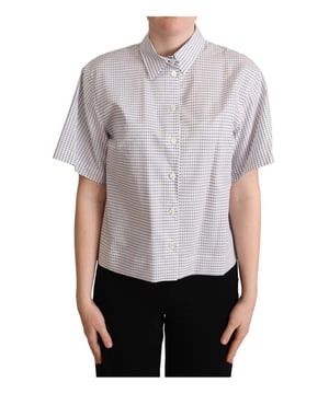 Completamente nuevo con etiquetas  
Camisa 100% auténtica de Dolce & Gabbana  
Elaborada con algodón de la más alta calidad  
Camisa de medio brazo con un elegante patrón de lunares  
Hecha en Italia  
Polo de manga corta con cuello  
Clásica combinación de colores blanco y azul  
Detalles sutiles del logo  
Perfecta para mujeres que aprecian la moda de calidad  
Material: 100% algodón