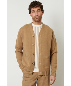 Be comfortable in style in this button down, knitted cardigan from Threadbare. With a V-neckline, ribbed cuffs and hem, this button up cardigan is the perfect addition to your wardrobe. Complete with branded metal tab above the hem, five mock horn buttons and two patch pockets. Made from a super-soft yarn with wool, this style is ideal for layering. Pair with dark denim jeans, a white t-shirt and boots for a stylish, casual look.