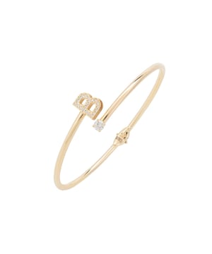 Design:This simple but beautifully styled initial bangle bracelet is perfect for those who covet delicate jewellery with a hint of sparkle, offering a sophisticated finishing touch to any outfit.Pretty and petite, this initial open cuff bangle features a hinge on the underside which makes it easy to put on and take off. The opening is designed to be on top of the wrist, where a zircon adorned monogram sits on one side and a single larger cubic zirconia resides on the other.What can be more personal than a name? Give this initial bangle bracelet as the perfect personalised birthday gift. Materials:Handcrafted using 925 sterling silver, dipped in 22ct gold. White cubic zirconia.Style Notes:Perfect pairing to the initial ring.Personalised birthday gift ideas. Bridesmaid gifts. Simple everyday styling.Dimensions:Bracelet: 19.5cm Packaging:This item is presented in a Latelita London signature jewellery box.Care Instructions:To maintain your jewellery, wipe gently with a damp cloth that is soft and clean. Do not soak in water. Avoid contact with soaps, detergents, perfume or hair spray.