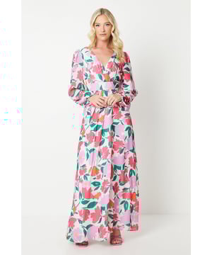 Elegant wrap neckline with a flattering V-shape
Lightweight chiffon fabric drapes beautifully
Vibrant peony floral print in a feminine palette
Maxi length with a flowing, sweeping skirt
Long sleeves with flared cuffs add a touch of drama

Exude effortless sophistication in this stunning chiffon maxi dress from Debut London. The vibrant peony print and wrap silhouette make it a standout choice for formal occasions like weddings, races, or black-tie events. Style it with strappy heels and a clutch for a polished, evening-ready look that radiates femininity and grace.