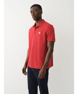 Pop that collar with the Buddha Patched Logo Polo Shirt. Crafted from soft cotton, this men’s polo features a basic collar. half-button placket, and short sleeves. Finished with a relaxed fit, ribbed trim, and a chest Buddha patch.