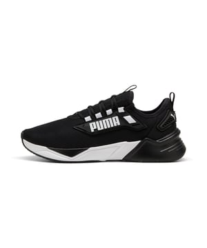 PRODUCT STORY: Hit the streets at pace in the Retaliate 3. The upper features a modern burrito construction in the collar, ensuring a perfect fit and enhancing ease of entry. Zoned rubber on the outsole provides traction in key areas while a colour dam allows for unique PUMA branding to pop in the rubber.  FEATURES & BENEFITS: The upper of the shoes is made with at least 20% recycled materials, SOFTFOAM+: Step-in comfort sockliner designed to provide soft cushioning thanks to its extra thick heel. DETAILS: Lace closure, Breathable mesh upper, Upper with burrito-construction collar, Heel TPU wings, Heel-to-toe drop: 8mm, Surface type: Road running, Recommended for: neutral pronators,