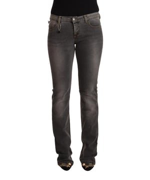 Merk: CNC COSTUME NATIONAL  
Materiaal: 98% Katoen 2% Elastaan  
Kleur: Grijs gewassen  
Stijl: Lage taille skinny denim  
Sluiting: Rits  
Logo details  
Geslacht: Dames