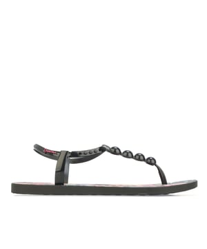 Womens Ipanema Frida Sandals in black.- Rubber upper.- Adjustable ankle strap.- Linked to the toe post with a beaded front strap.- Colourful Frida Kahlo-inspired foliage design printed on the Wave footbed.- Bright pink Ipanema logo.- Rubber sole.- Ref: 27021AI782