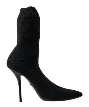 <ul>
  <li>Botas de media cana 100% autenticas de Dolce & Gabbana</li>
  <li>Diseno de tacon de aguja negro</li>
  <li>Hecho de material de viscosa de alta calidad</li>
  <li>Suela de cuero</li>
  <li>Detalles del logotipo</li>
  <li>Fabricado en Italia</li>
  <li>Elegante y comodo</li>
</ul>