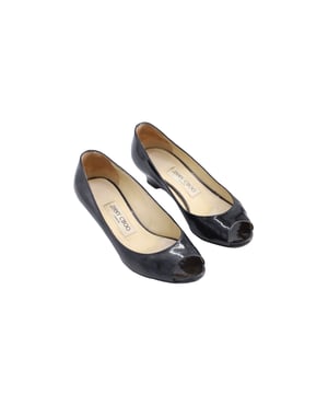 VINTAGE, RRP AS NEW
Effortlessly achieve a glamorous finish with these wedges by Jimmy Choo. These shoes are crafted from black patent leather. They have peep toes and wedge heels. The padded insoles are lined with beige leather and feature Jimmy Choo labels. 

Jimmy Choo 'Baxen' Peep-toe Wedges in Black Patent Leather
Condition: very good
Sign of wear: wornout soles and heels, leather creases on insoles
Material: Patent Leather
Color: Black
Size: 37
SKU: 130922