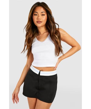 A pair of shorts that resemble a skirt...what more could a girl want? Designed to give you a bit more freedom while still looking cute, this skort is the perfect combination of style and practicality. From floaty skorts for summer days to white skorts perfect for showing off those bronzed pins, just team with chunky trainers and a crop top and your go-to off duty look is sorted. Summer styling has literally never been this easy. From trending cargo skorts to floaty printed options, shop it all on boohoo.Style: SkortsFabric: PolyesterLength: Short