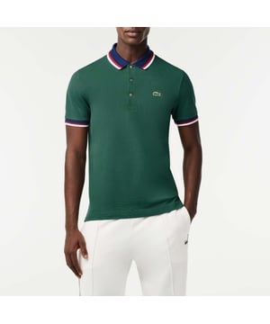 Regular Fit Stretch Cotton Piqué Contrasterende Kraag Poloshirt Stretch minikatoen piqué Gestreepte polokraag met drie knopen Regular Fit Gestreepte mouwuiteinden Geborduurde groene krokodil op de borst