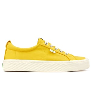 Step Into The Sunshine With These Bright Red Cariuma Oca Low Trainers For Eco-friendly Style And Comfort. These Lace-up Plimsolls Feature A Soft, Organic Cotton Canvas, A Cushioned Cork Plus Bio-based Foam Insole For Casual Comfort And A Sturdy Rubber Sole For Traction. The Shiny Silver Eyelets Add A Touch Of Glam. Embrace This Fashion-forward, Laid-back Design With A Good Conscience And Enhance Your Wardrobe With These Branded Skater Kicks.