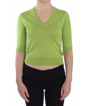 Marca: Dolce & Gabbana  
Color: Verde  
Diseño: Suéter de manga corta con cuello en V  
Detalles del logo  
Hecho en Italia  
Material: 100% Lana
