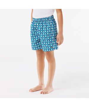 Monogram Print Swim Trunks Recycled polyester made from manufacturing offcuts Elasticated waist Embroidered crocodile on leg   Monogram Print Swim Trunks Recycled polyester made from manufacturing offcuts Elasticated waist Embroidered crocodile on leg