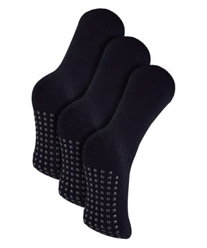 Bamboo Thermal Socks by THMO bring you the highest level of comfort with these soft, natural bamboo socks. Made from organic cotton yarn and super soft bamboo fibres, these socks provide comfort and warmth all day long.The high quality bamboo offers a softer and luxurious feel on your feet, helping you to stay relaxed and comfortable especially during the winter months. These anti slip grip socks have been designed to prevent you from slipping on surfaces such as hard wooden floors or kitchen tiles. The dotted design on the foot of the sock is simple but effective.Bamboo fibres are thermo-regulating, which help your feet stay warm during the cold months of Winter. The thermal properties in these socks provide an extra layer of insulation, allowing your feet to stay warm.These socks have a stretchy comfort top that moulds to your leg to reduce constriction rings and tightness, which allows for regular circulation. As well as all day comfort, these socks feature a cushioned foot bed providing your feet with an extra layer of support.These socks come in a pack of three and are available in Black. Made From 43% Viscose (From Bamboo), 40% Organic Cotton, 12% Polyester, 3% Polyamide, 2% Elastane, they are available in sizes 4-8 UK, 6-11 UK & 12-14 UK and are Machine Washable at 40.