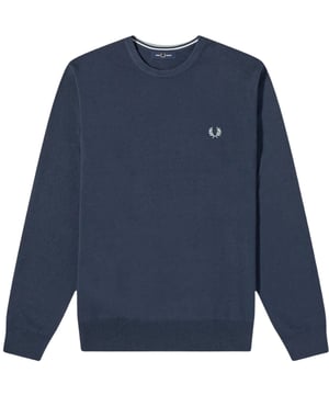 Klassischer V-Ausschnitt-Pullover in Marineblau von Fred Perry. Werten Sie Ihre Garderobe mit dem lebhaften blauen V-Ausschnitt-Pullover von Fred Perry auf! Das klassische V-Ausschnitt-Design verleiht Ihrem Outfit einen Hauch von Eleganz, während die Farbe für einen Farbtupfer sorgt. Sehen Sie stilvoll aus und fühlen Sie sich selbstbewusst in diesem Must-have-Modestück. 52 % Wolle, 48 % Baumwolle, elastische Ärmelbündchen. V-Ausschnitt, schmale Passform, lange Ärmel. Elastische Ärmel und Saum, Lorbeerkranz-Logo. Stilcode: K9601 F36