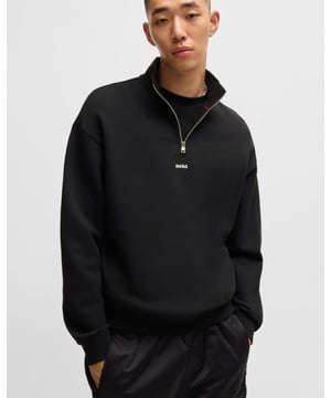A versatile sweatshirt with a zip collar by HUGO. Featuring a small logo print, this relaxed-fit layer is crafted in soft cotton terry.

Relaxed fit
Stand collar
Fastening top: Zip closure
Long sleeves
Ribbed cuffs
Standard length

100% Cotton, partcode.71: 96% Cotton, 4% Elastane 
50525881
 