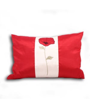 Featuring an embroidered poppy motif design, this vibrant cushion will brighten your interior.
