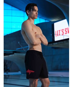 Made for those as shark-obsessed as us, these graphic print swim shorts are designed with signature shark print to the side, an elasticated drawstring waistband, side and rear pockets and mesh lining.