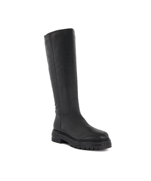 Take your casual styling to the next level with our long Tristina boot. Crafted from the finest material, and featuring side pull-on tabs and tonal stitching, these knee-high boots are an effortless addition to autumn styling. Culminating with a side zip and set on a cleated sole accented with ridged details, this versatile profile offers a timeless aesthetic with a contemporary touch.