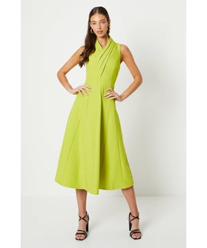 Elegant crepe fabric with a beautiful drape
Flattering pleat collar neckline
Feminine full skirt with a midi length
Sleeveless design for a modern touch
Concealed back zip fastening for a seamless look

Exuding sophistication, this Coast dress is a refined choice for formal occasions. The pleat collar neckline and full skirt silhouette create an elegant, feminine aesthetic. Style with heeled sandals and a clutch for a polished ensemble suitable for weddings, races, or any special event where you want to make a stylish statement.
