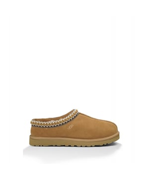 A slipper for all occassions, Tasman features the same light, durable outsole as the Classic UGG boot, so you can wear it both indoors and out. Lined with plush natural wool, it&rsquo;s crafted from soft suede with an embroidered braid and easy slip-on silhouette.
&nbsp;

 Suede  Tasman braid  Sheepskin lining  UGGpure™ wool insole  Treadlite by UGG™ outsole  Nylon binding This product contains real fur from sheep or lamb. Fur may be sourced from Australia, Ireland, the United Kingdom, or the United States. It has been artificially dyed and treated. Made in Vietnam.
&nbsp;
5955

&nbsp;