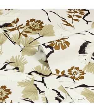 Glide through the air with the majestic birds soaring through tropical foliage with the Demoiselle wallpaper. These Exotic birds fly over an array of quirky leaves in a stunning range of hues and intricate detailing, will make a statement in whichever room you put it in. This wallpaper is a paste the wall application; simply paste the wall, hang your paper, and leave to dry. Each roll is 10m long and 52cm wide. Pattern repeat: 53cm Straight match. Our Demoise wallpaper can be used to paper the whole room or to create an eye-catching feature wall. This wallpaper is also wipeable so that any light marks can be dabbed away.