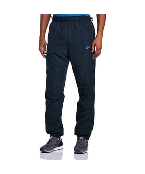 Nike Mens Light Weight Woven Track Pants.  
They've Got an Elastic Waistband With Drawstring Closure on Both Sides of the Waist for Ultimate Comfort Support.  
2 Hand Pockets,  Additional Secured Zip Pocket on the Left Leg.   
Elastic Waistband at the Ankles With Zip Closure Details Going Down Both Sides.   
Perforated Stripes and a Breathable Mesh Lining for Comfort.  
Other Details Include a Contrast Nike Swoosh and Logo Embroidery on Left Thigh.  
Large Contrast Nike Wordmark on Back of Lower Right Leg.  
Logo and Nike Tab Red Stitching on Back of Upper Right Leg.
Ideal for Training and Daily Activities.