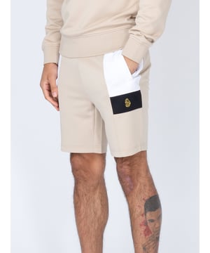 This comfy pair of shorts from LUKE are perfect for your laid-back looks. They're crafted from a classic tricot and are fitted with a comfy drawcord waistband for a customised fit. They feature essential front zip pockets and are detailed with contrast cut and sew panels. The brand's iconic lion head embroidery sits on the left leg to finish the look.