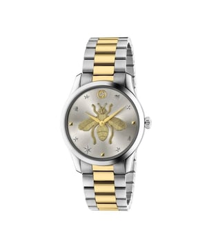 Gucci G-Timeless Bracelet Watch YA1264131. This model has stainless steel 38mm case featuring silver sunbrushed dial with central yellow gold bee motif. This model has a quartz movement and is water resistant to 50 metres. Presented on a stainless steel and yellow gold PVD bracelet with deployment fastening.