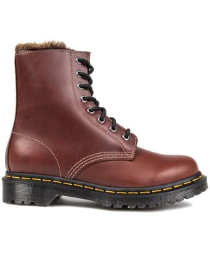 Women's Dark Tan Dr. Martens 1460 Serena Lace-up Boots With A Leather Upper Featuring 8 Eyelet Lacing System, And Signature Airwair Heel Loop. These Ladies' High-top Boots Have A Soft Faux Fur Brown Lining, And Iconic Yellow Stitching And Goodyear Welted Air-cushioned Sole With Rugged Tread.