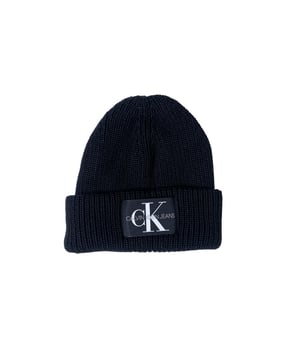 Marca: Calvin Klein.
  Genero: Mujeres.
  Tipo: Tapas.
  Temporada: Otono/Invierno.
  Color: Negro.
  Cierre: Slip on.
  Composicion: 50% acrilico 50% lana.
  Lavado: Lavar a maquina a 30°.