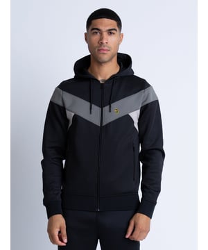 Comfortable, cool and classic, this colour block, zip through hoody from LUKE is cut from tricot fabric and fitted with comfy rib trims throughout. It features contrast cut and sew panels and handy lower zip pockets, perfect for all your essentials. The look is then signed off with the brand's iconic lion head embroidery on the left chest.