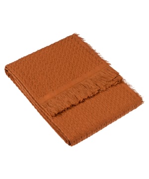 Add a timeless touch to your home with the ultra-soft Abel waffle throw. Crafted with a sophisticated waffle weave, it adds warm, natural tones to help ground your interior space and build up textural layers. Finished with a raw frayed edge on four sides to help further create a relaxed, understated look.